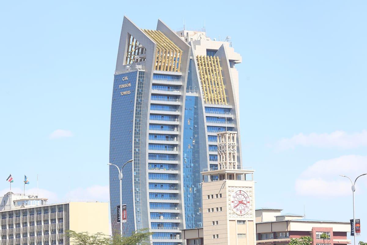The Central Bank of Kenya Pension Towers in Nairobi: two curved glass towers with gold fins beside the city clock tower