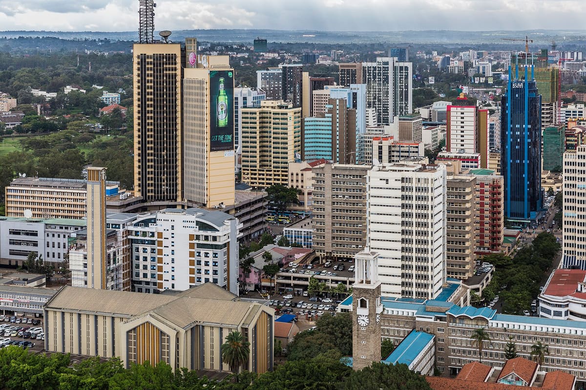 Nairobi city centre seen from above, with the Holy Family Basilica among office towers